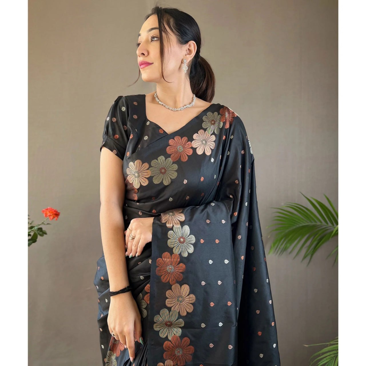Elegant Black Floral Printed Saree with Earthy Tone Design